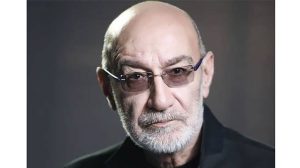 اهنگ تو این دنیای وارونه منم تنها که برعکسم